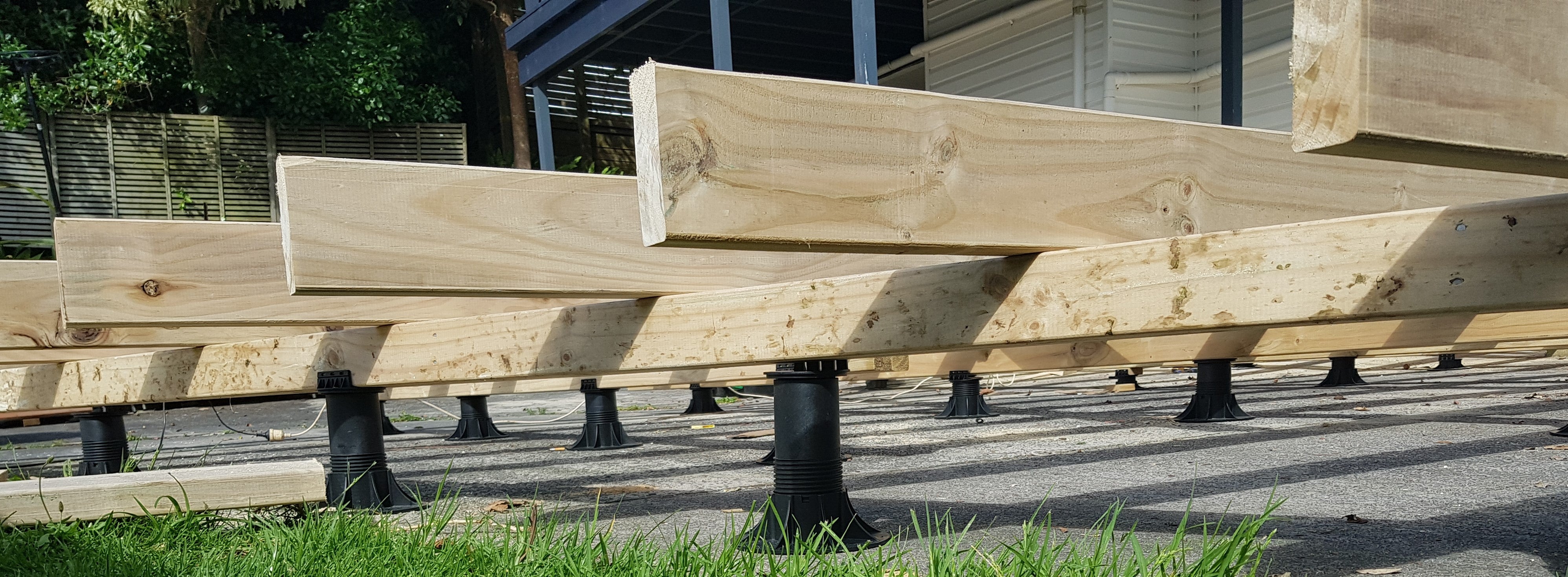 The Advantages of Pedestal Deck Support Systems Over Traditional Deck Piles
