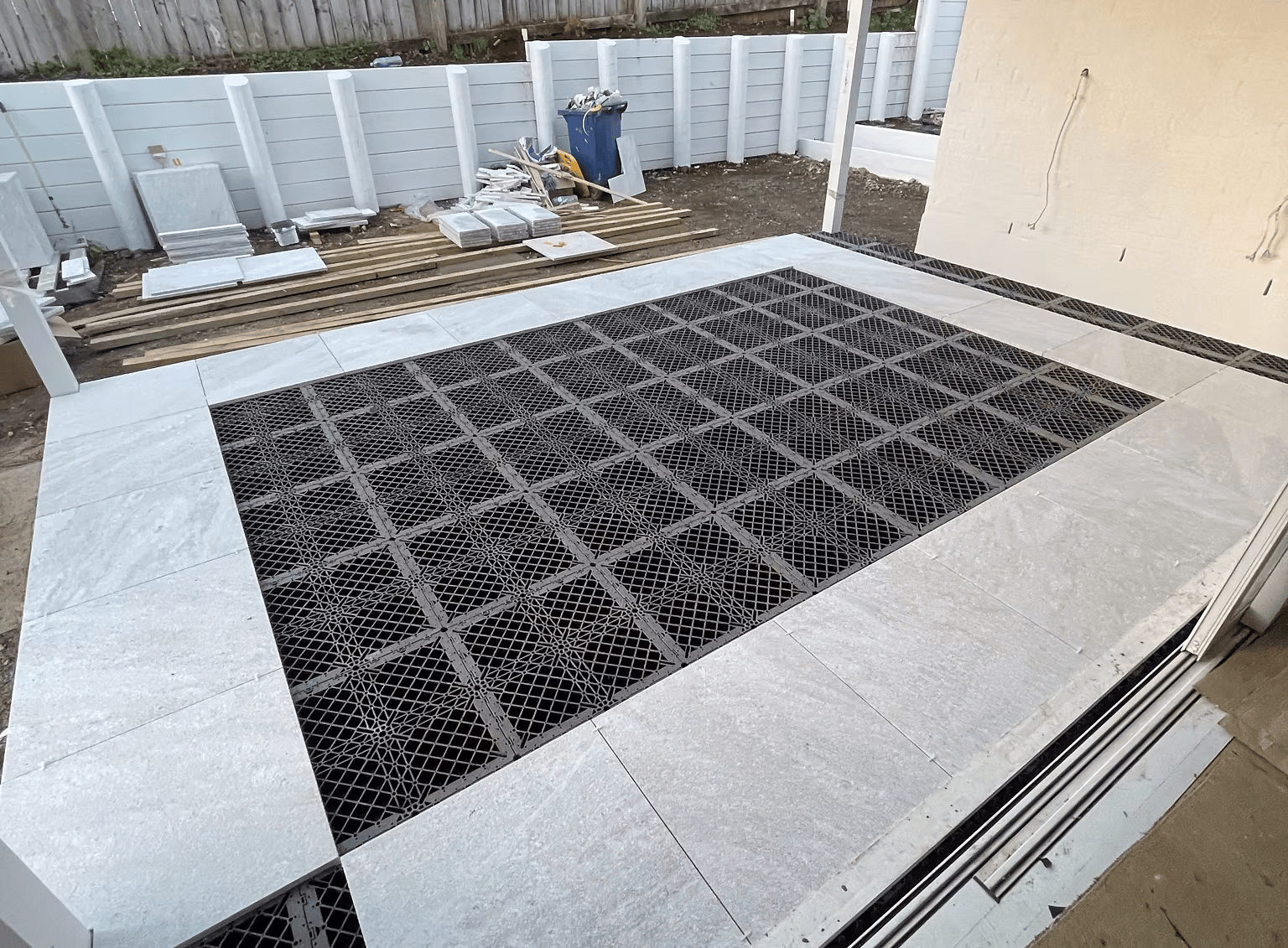 Non-Structural Stone, Strong Foundation: 20mm Quartz Over Nuragrid At Queensway
